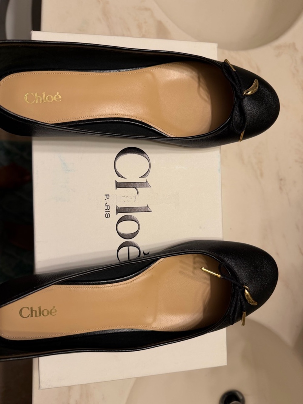Chloé Black Leather Ballet Flats with Gold Bow Accent